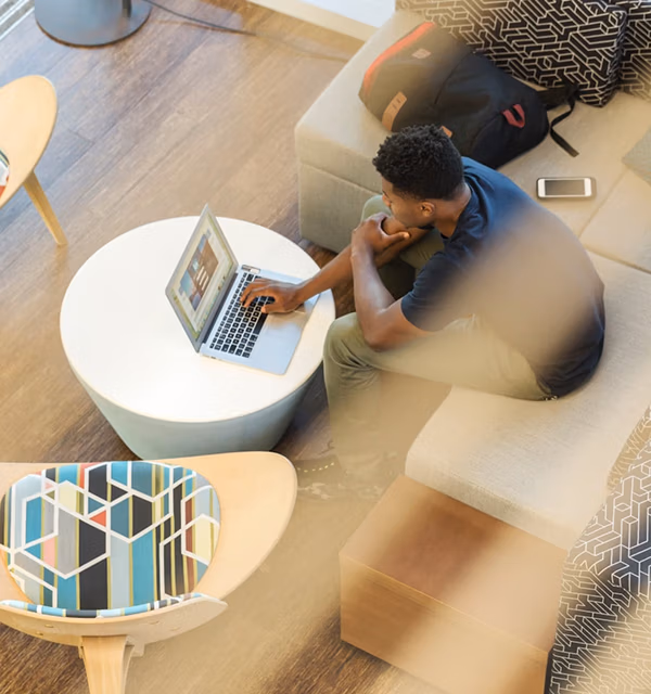 person looking at computer searching for a candidate for the position