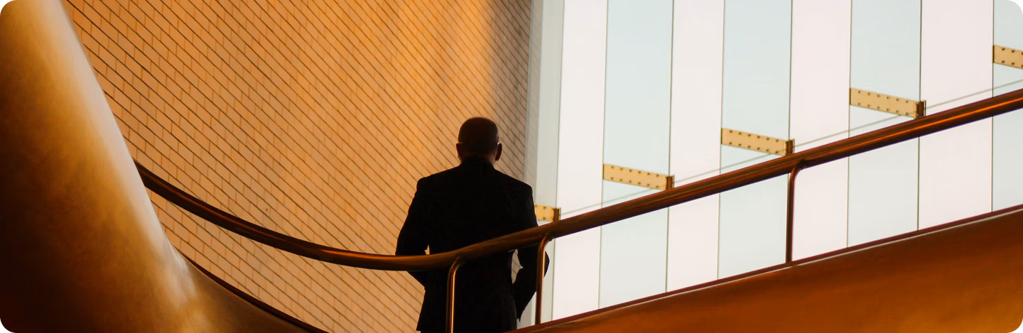 background image of an executive in business looking around